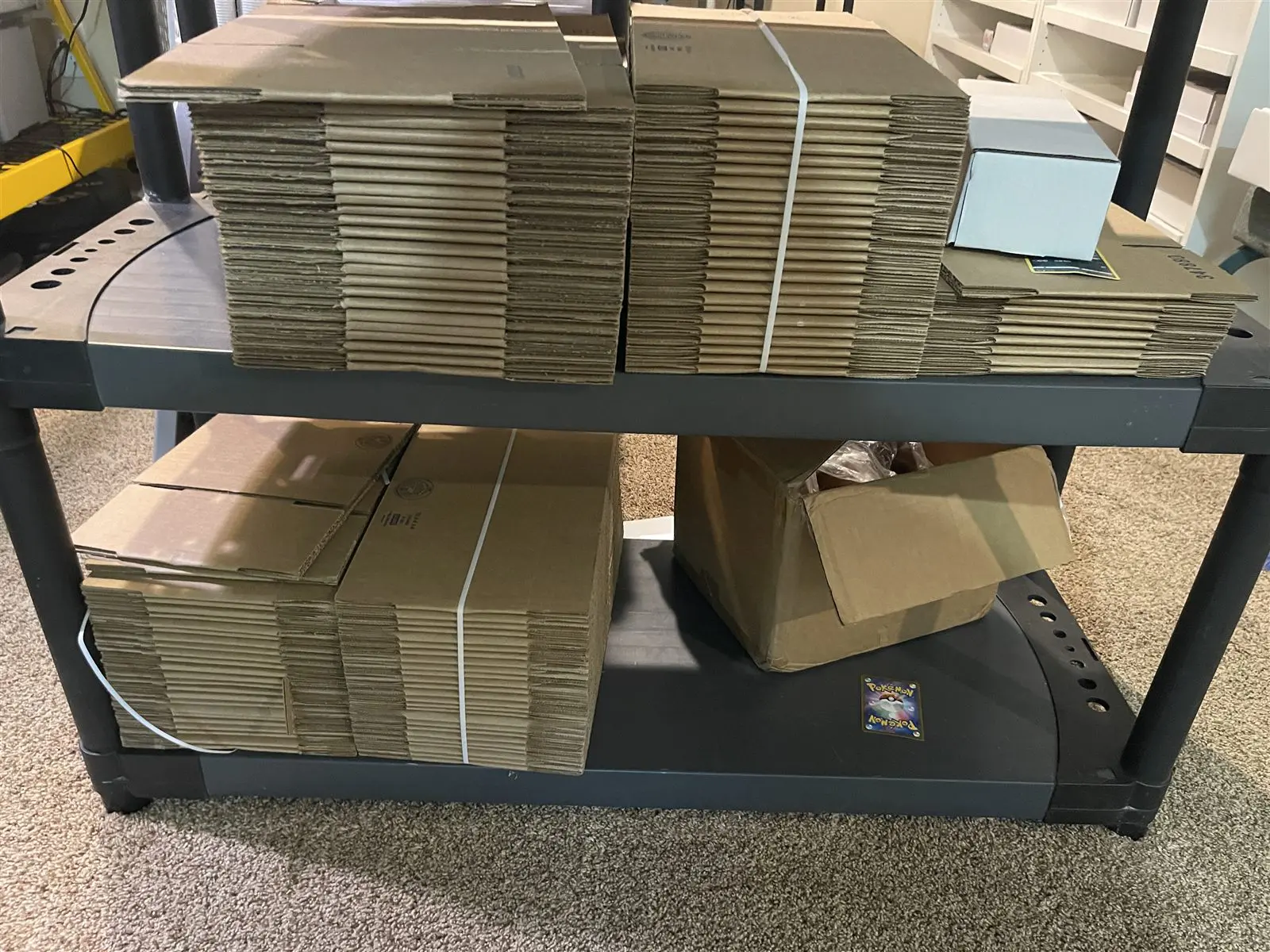 Shipping boxes ready for mail-in Pokemon card collections