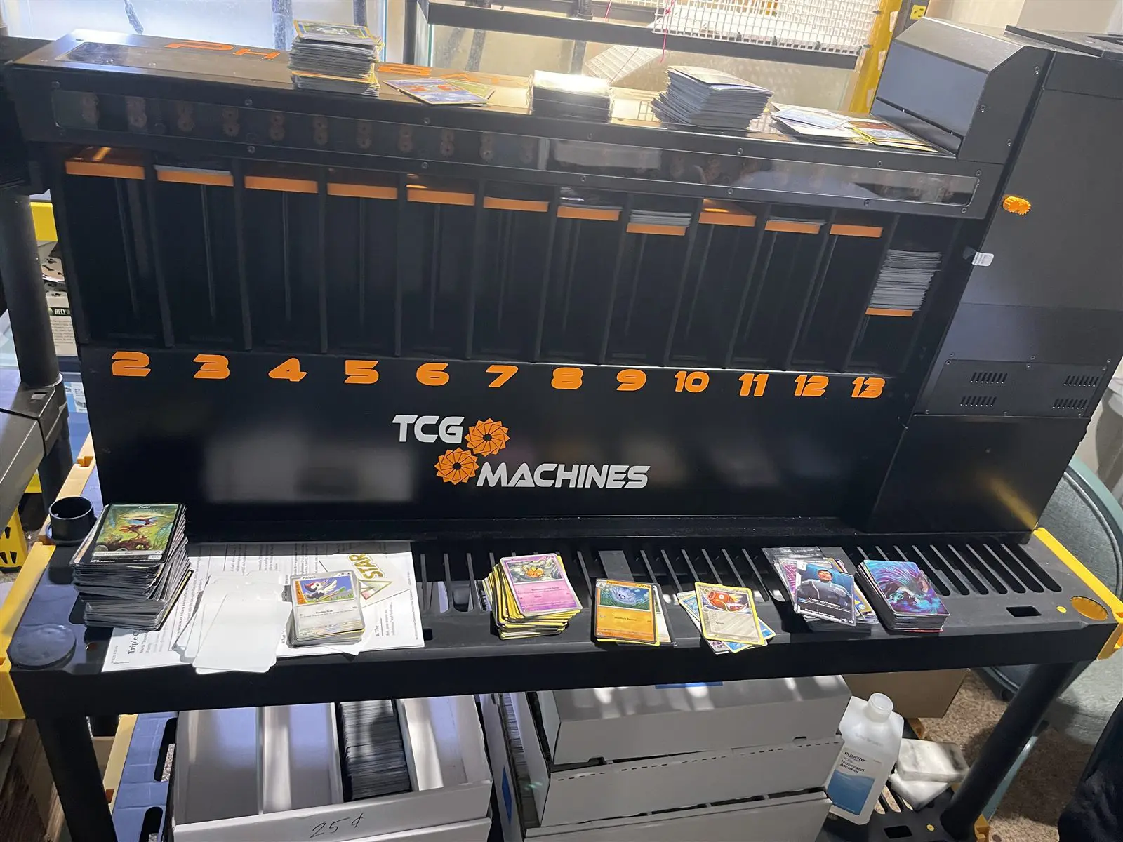 The card sorting machine at Triple Cities TCG, loaded with Pokemon cards